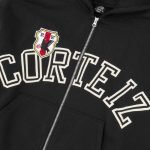 Corteiz Arch Shield Zip Hoodie Black